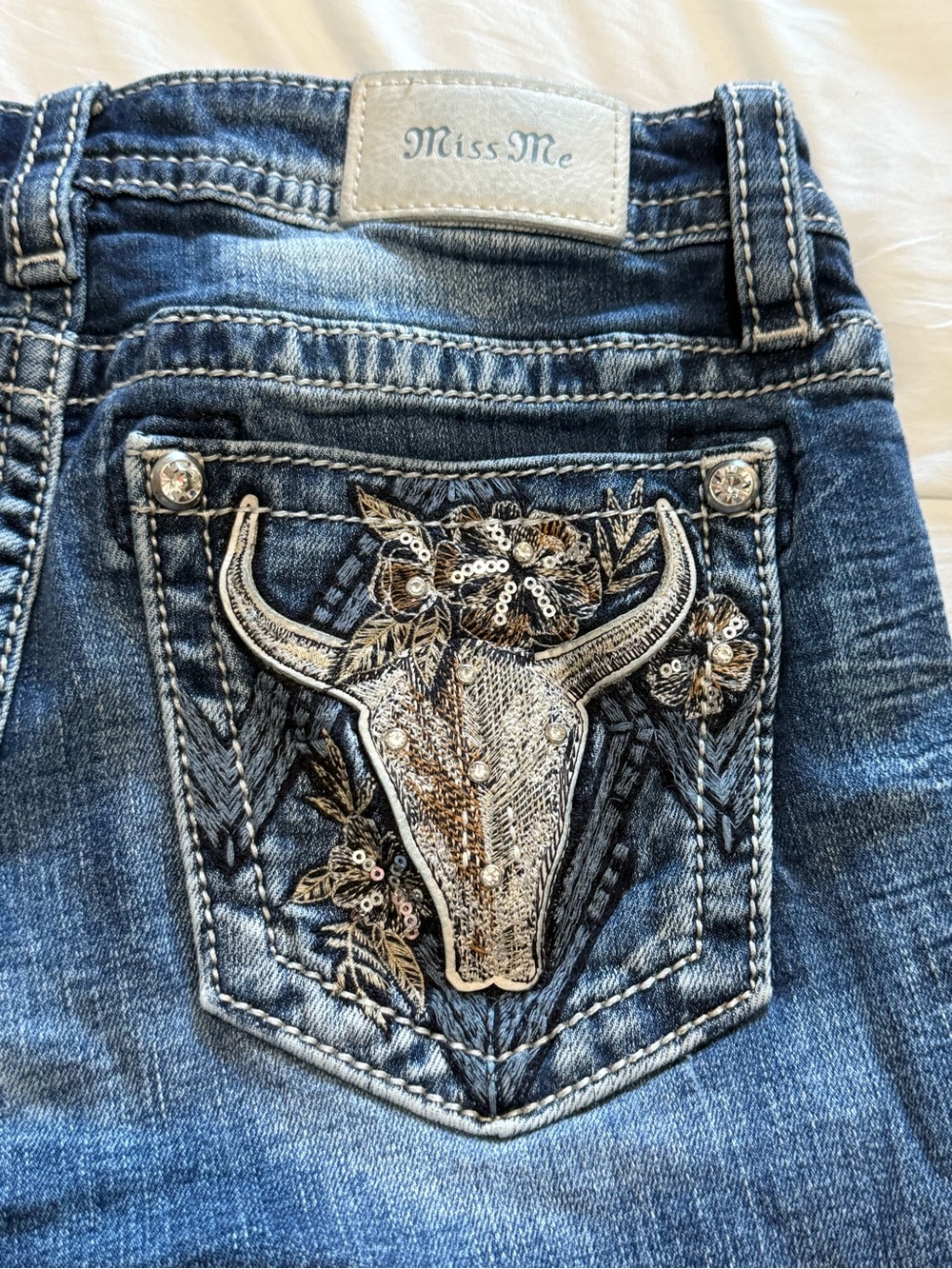 Miss Me Blue Denim Jeans with Embroidered Bull Skull Pocket